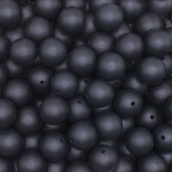 close up view of a pile of 15mm Black Round Silicone Bead