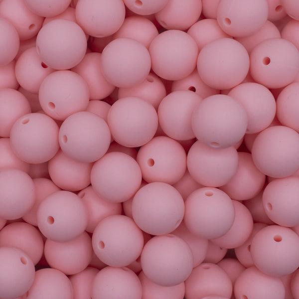 close up view of a pile of 15mm Candy Pink Round Silicone Bead