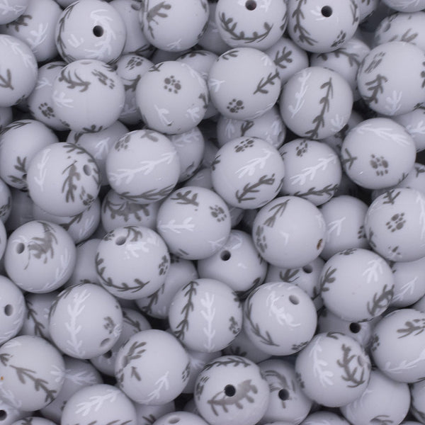 close up view of a pile of 15mm Olive Branch Print Round Silicone Bead