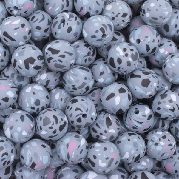 close up view of a pile of 15mm Gray Terrazzo Print Round Silicone Bead