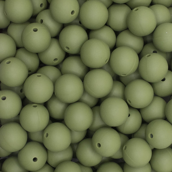 close up view of a pile of 15mm Bean Green Round Silicone Bead