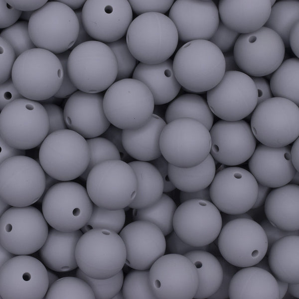 close up view of a pile of 15mm Light Gray Round Silicone Bead