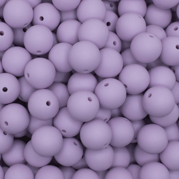 close up view of a pile of 15mm Lilac Purple Round Silicone Bead