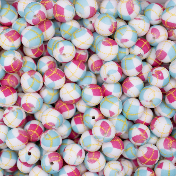 top view of a pile of 15mm Pink Argyle Print Round Silicone Bead