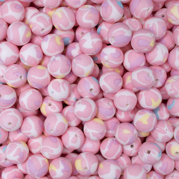 top view of a pile of 15mm Pink Patterned Round Silicone Bead