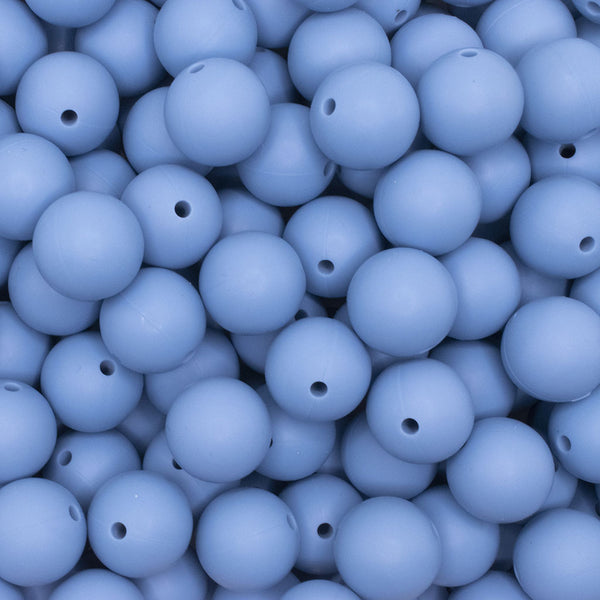 close up view of a pile of 15mm Powder Blue Round Silicone Bead