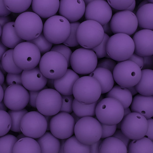 close up view of a pile of 15mm Purple Round Silicone Bead