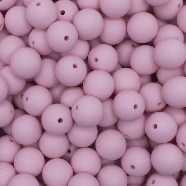 close up view of a pile of 15mm Quartz Pink Round Silicone Bead