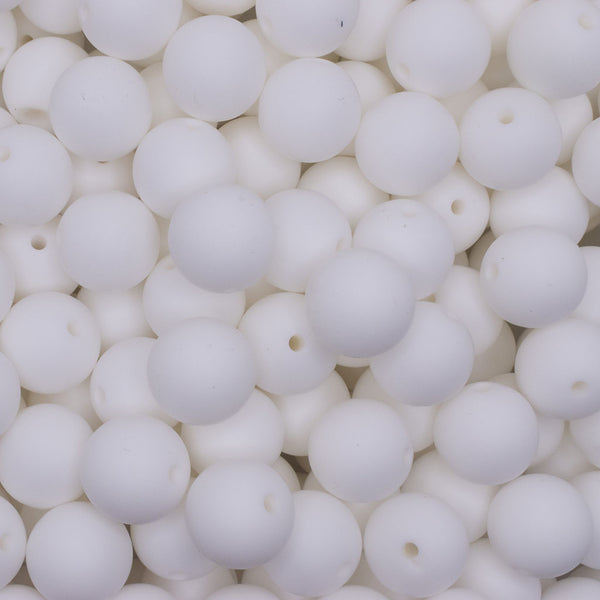 close up view of a pile of 15mm White Round Silicone Bead