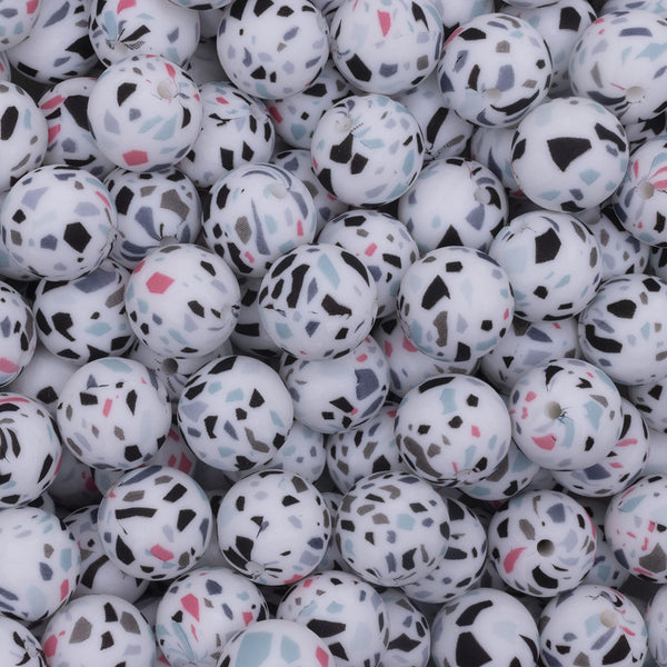 close up view of a pile of 15mm White Terrazzo Print Round Silicone Bead