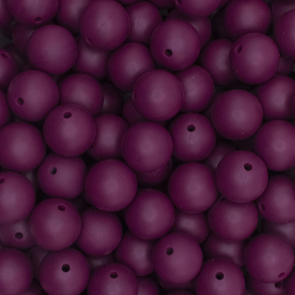 close up view of a pile of 15mm Wine Red Round Silicone Bead