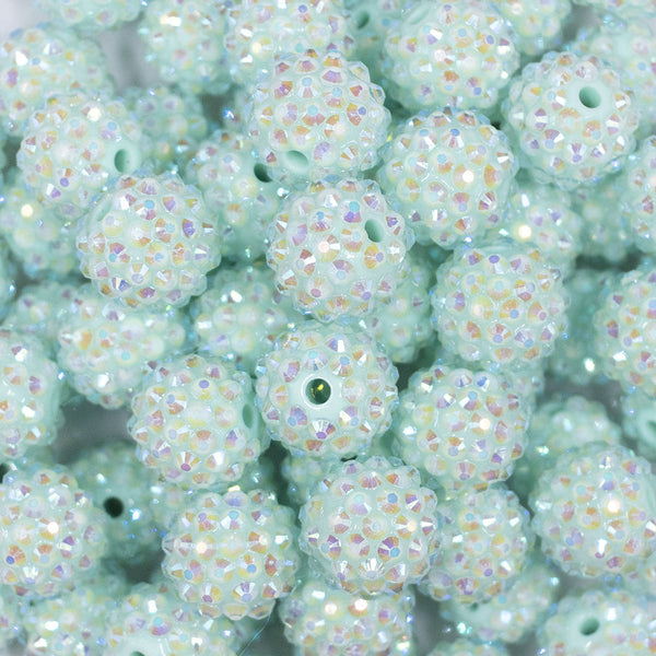 Close up view of a pile of 16mm Aqua Marine Rhinestone AB Chunky Bubblegum Jewelry Beads