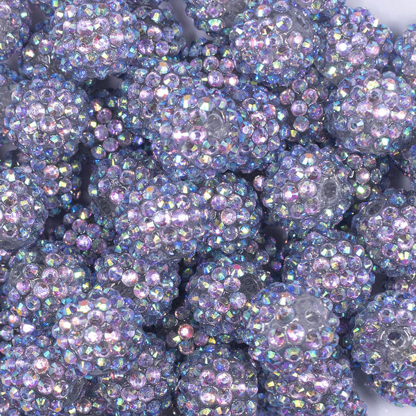 Close up view of a pile of 16mm Clear Hologram Rhinestone AB Chunky Bubblegum Jewelry Beads