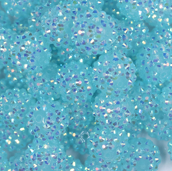 Close up view of a pile of 16mm Blue Luster Rhinestone AB Chunky Bubblegum Jewelry Beads