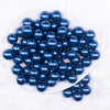 Top view of a pile of 16mm Dark Blue Faux Pearl Acrylic Bubblegum Jewelry Beads
