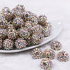 Front view of a pile of 16mm Gold Shimmer Rhinestone AB Chunky Bubblegum Jewelry Beads