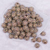 Top view of a pile of 16mm Gold Shimmer Rhinestone AB Chunky Bubblegum Jewelry Beads