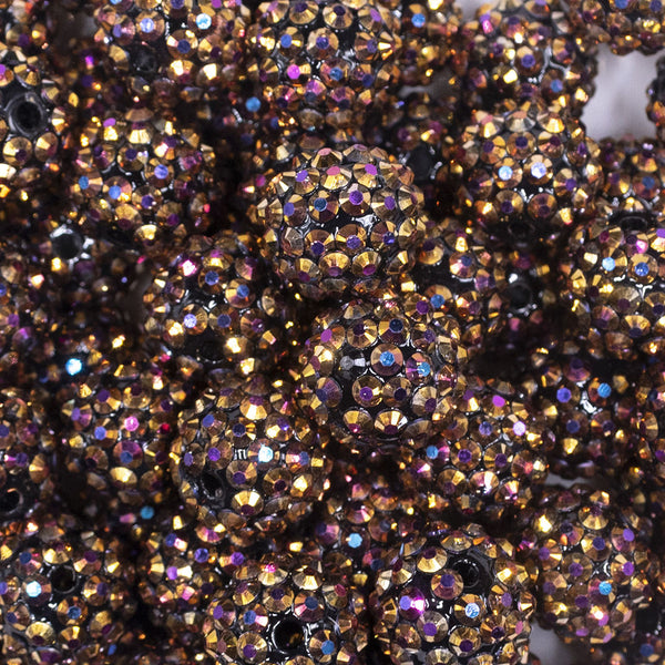 Close up view of a pile of 16mm Golden Coffee Rhinestone AB Chunky Bubblegum Jewelry Beads