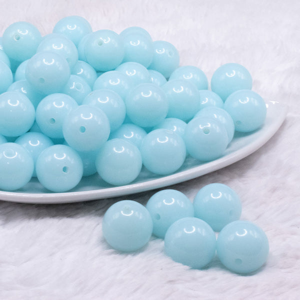 front view of a pile of 20mm Ice Blue Solid Bubblegum Beads
