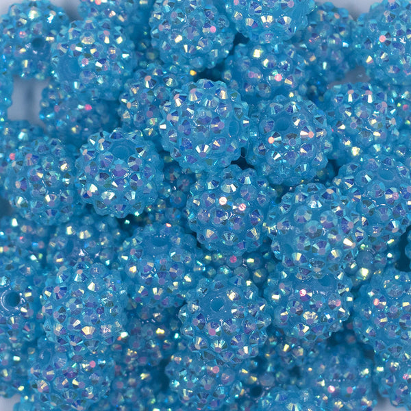 Close up view of a pile of 16mm Jelly Blue Dazzle Rhinestone Chunky Bubblegum Jewelry Beads