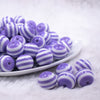 Front view of a pile of 16mm Purple with White Stripe Bubblegum Beads