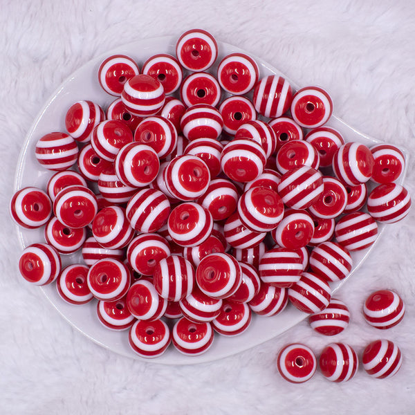 Top view of a pile of 16mm Red with White Stripe Bubblegum Beads