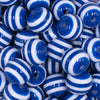 Close up view of a pile of 16mm Royal Blue with White Stripe Bubblegum Beads