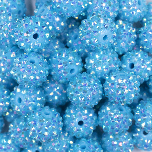 Close up view of a pile of 16mm Solid Blue Dazzle Rhinestone AB Chunky Bubblegum Jewelry Beads