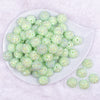 Top view of a pile of 16mm Spearmint Green Rhinestone AB Chunky Bubblegum Jewelry Beads