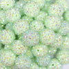 Close up view of a pile of 16mm Spearmint Green Rhinestone AB Chunky Bubblegum Jewelry Beads