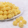 Front view of a pile of 16mm Yellow Rhinestone AB Chunky Bubblegum Jewelry Beads