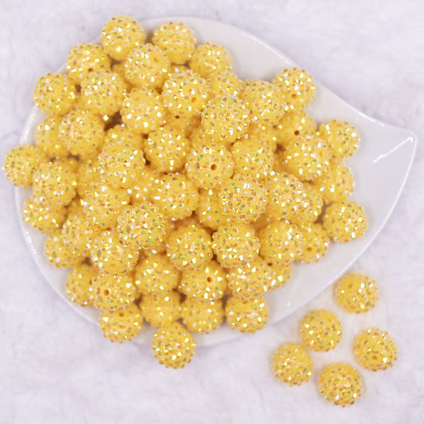 Top view of a pile of 16mm Yellow Rhinestone AB Chunky Bubblegum Jewelry Beads