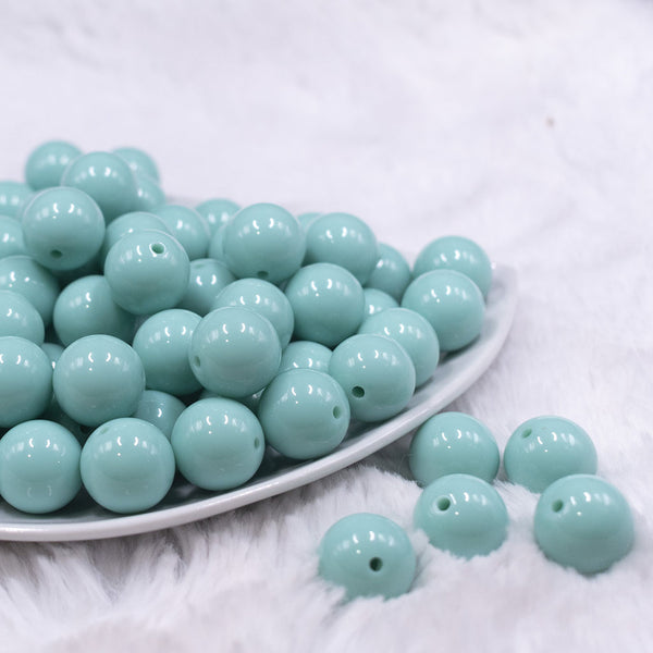 Front view of a pile of 16mm Aqua Blue Solid Acrylic Bubblegum Jewelry Beads
