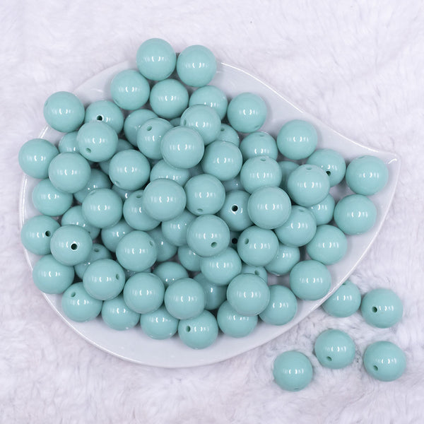 Top view of a pile of 16mm Aqua Blue Solid Acrylic Bubblegum Jewelry Beads