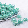 front view of a pile of 16mm Aquamarine Solid AB Bubblegum Beads