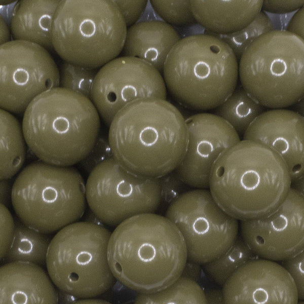 close up view of a pile of 16mm Army Green Solid Acrylic Bubblegum Jewelry Beads