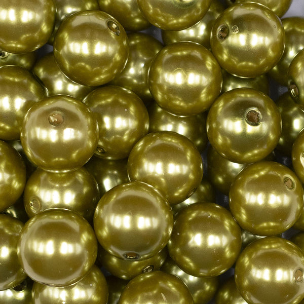 Close up view of a pile of 16mm Avocado Green Faux Pearl Acrylic Bubblegum Jewelry Beads