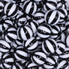 close up view of a pile of 16mm Black and White Beach Ball Bubblegum Beads