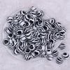 Top view of a pile of 16mm Zebra Print Acrylic Bubblegum Jewelry Beads