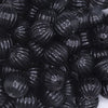 close up view of a pile of 16mm Black Opaque Pumpkin Shaped Bubblegum Bead