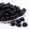 Front view of a pile of 16mm Black Solid Acrylic Bubblegum Jewelry Beads