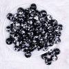 top view of a pile of 16mm Black Tablet Acrylic Bubblegum Beads
