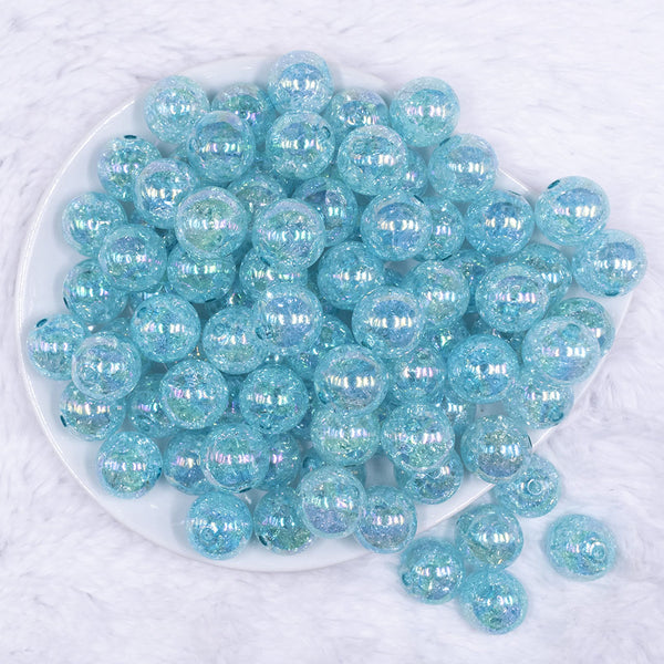 top view of a pile of front view of a pile of 16mm pastel blue Crackle AB Bubblegum Beads