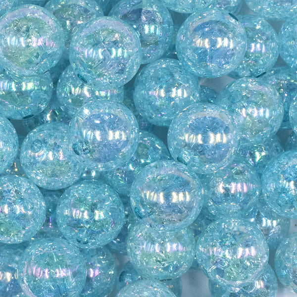 close up view of a pile of front view of a pile of 16mm pastel blue Crackle AB Bubblegum Beads