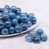 front view of a pile of 16mm Blue Galaxy Sparkle Resin Bubblegum Beads