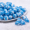 front view of a pile of 16mm Blue Tablet Acrylic Bubblegum Beads