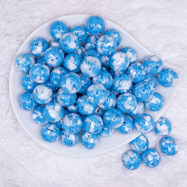 top view of a pile of 16mm Blue Tablet Acrylic Bubblegum Beads