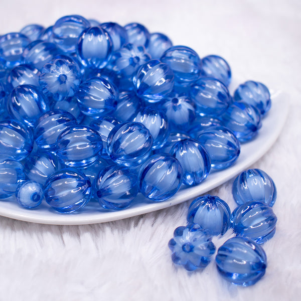 front view of a pile of 16mm Blue Transparent Pumpkin Shaped Bubblegum Beads