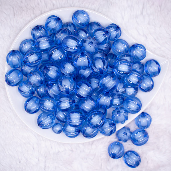 top view of a pile of 16mm Blue Transparent Pumpkin Shaped Bubblegum Beads