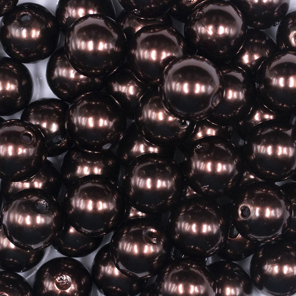Close up view of a pile of 16mm Brown Faux Pearl Acrylic Bubblegum Jewelry Beads